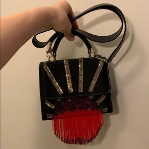 Les petite joueurs sunrise leather satin handbag